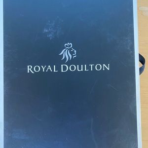 Royal Doulton flatware. 7 sets each with two forks knife and two spoons. New
